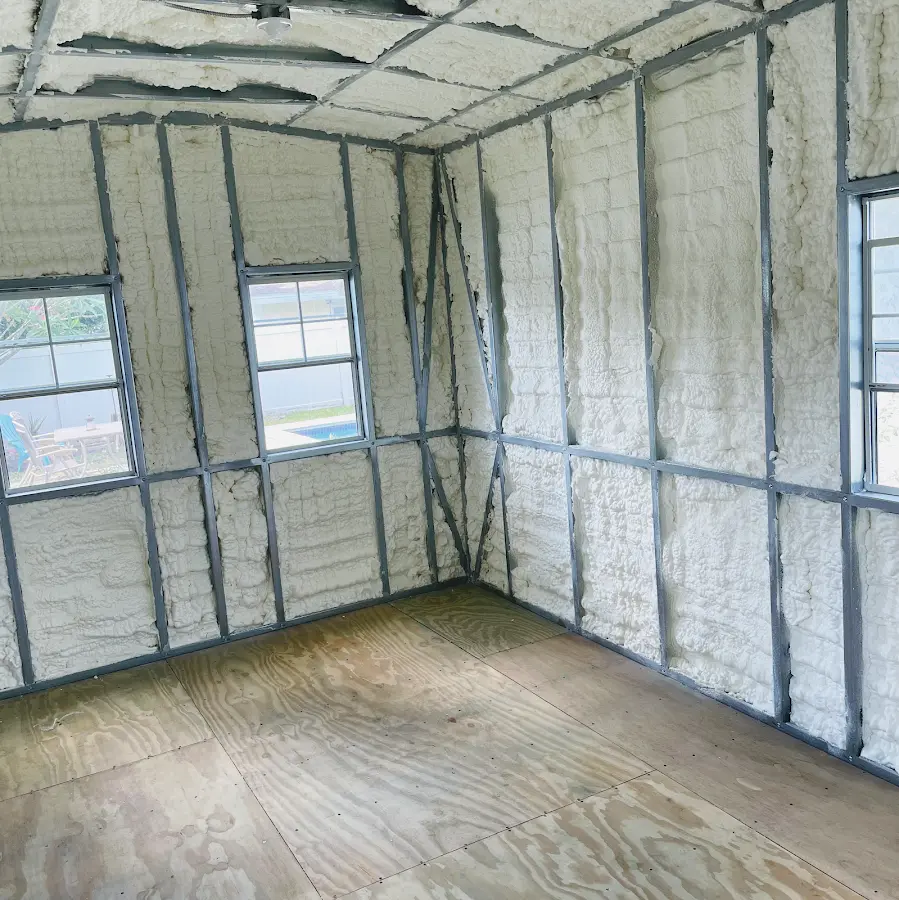 Closed-cell spray foam insulation applied to wall cavities in a residential project in Blytheville